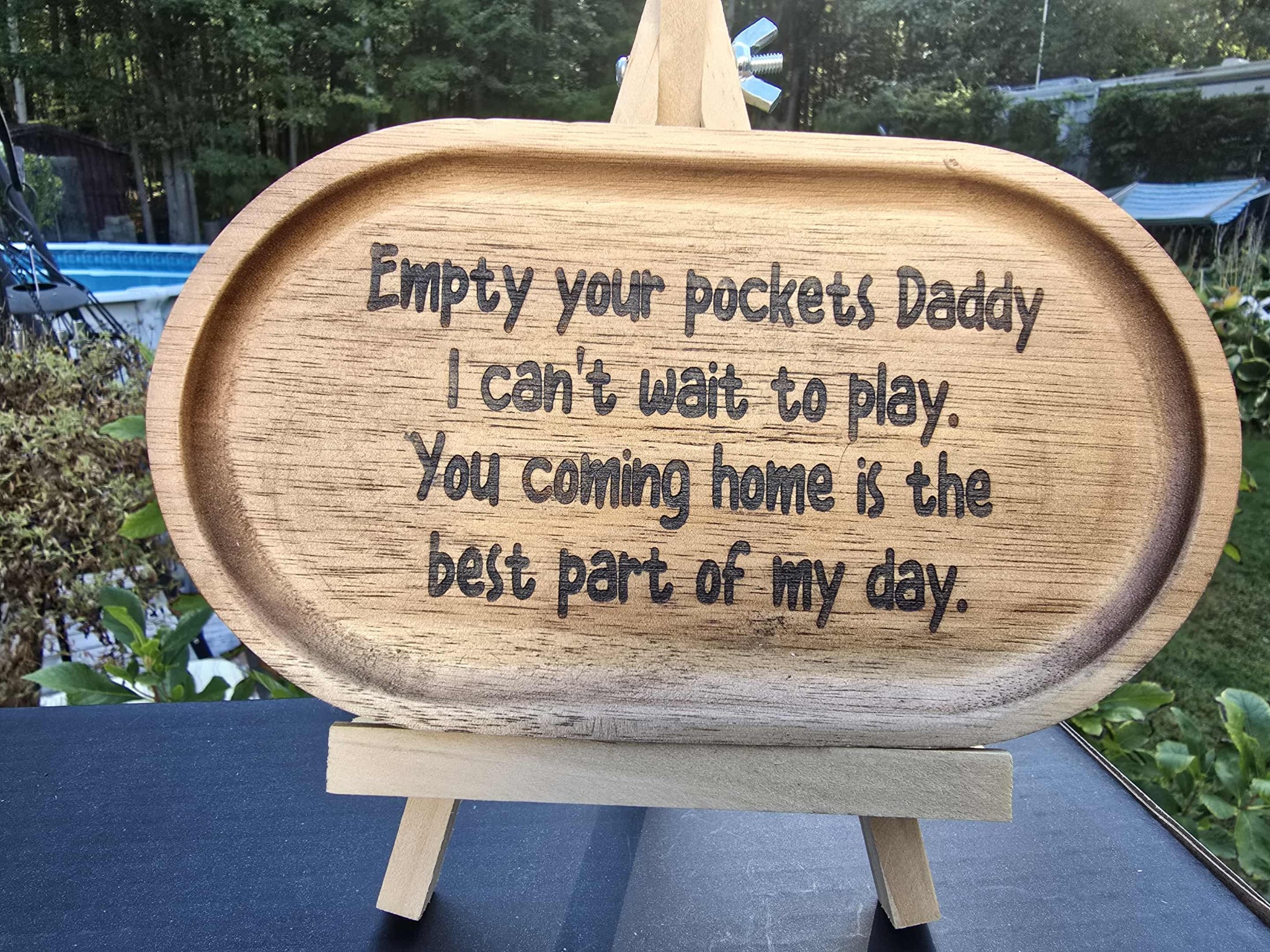 Wooden change holder engraved with a message from a dog to Daddy
