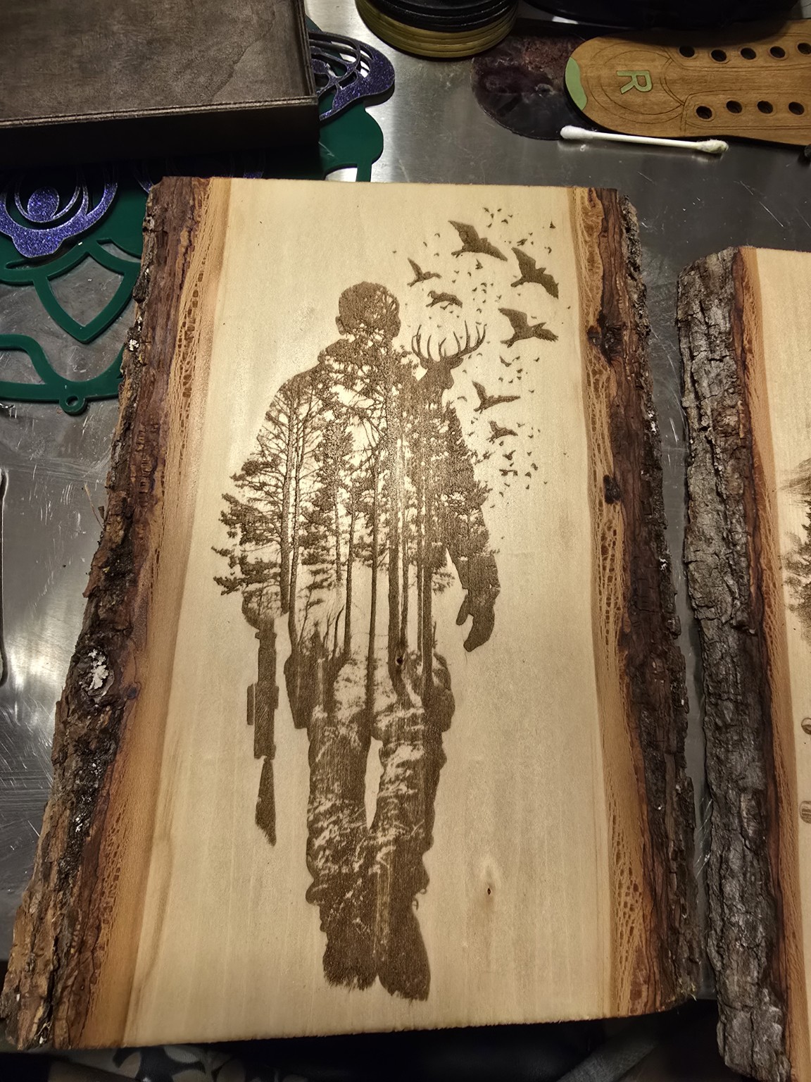 Detailed engraved figure on a wood slab