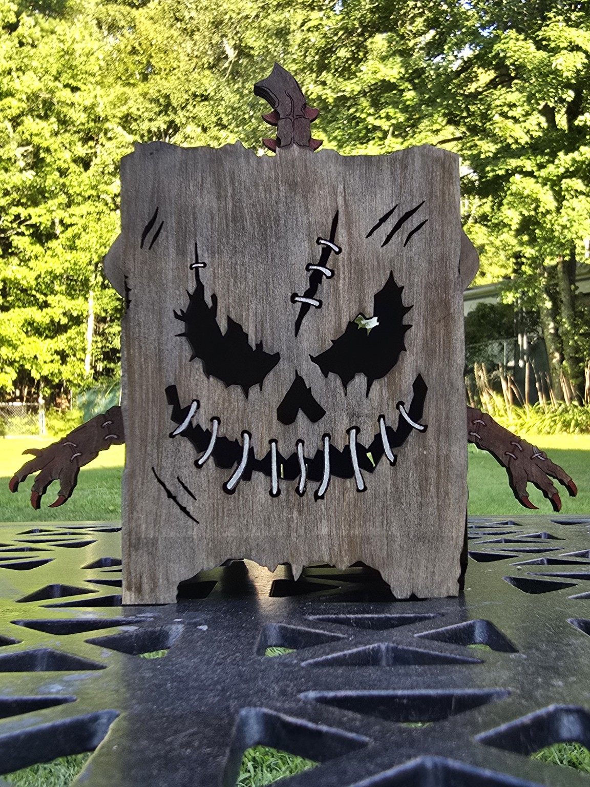 Decorative pumpkin artwork made from wood