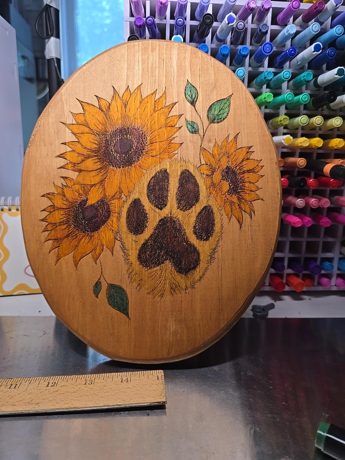 Round wooden sunflower artwork