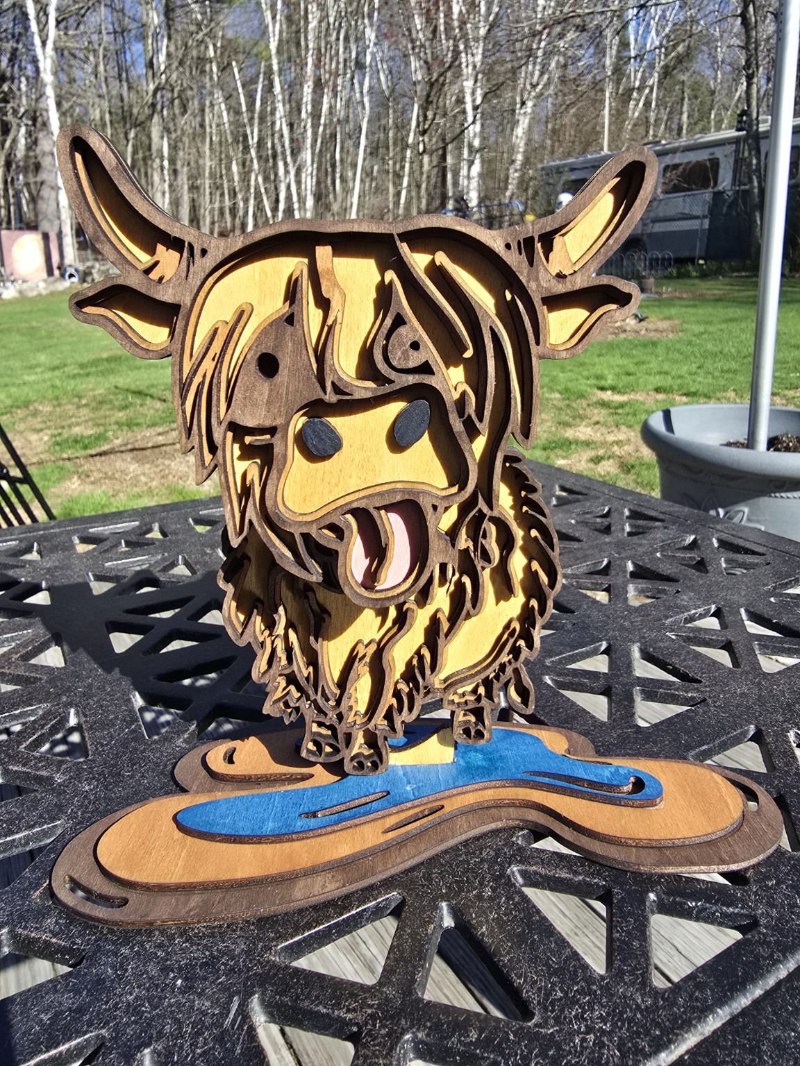 Round wooden wildlife artwork